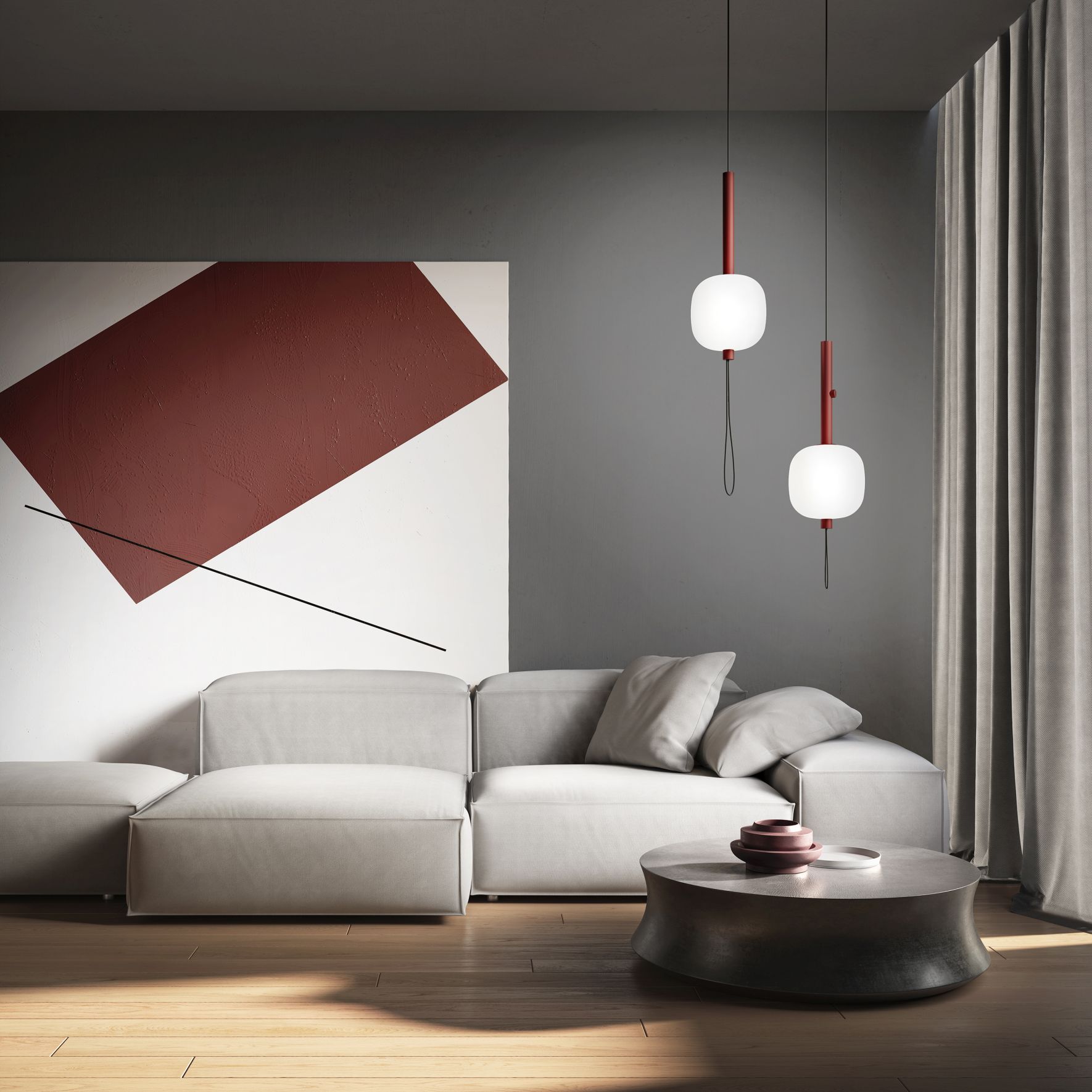 Weiße Motus Pendelleuchte von Kdln über Sofa in modernem Wohnzimmer mit Kunst.