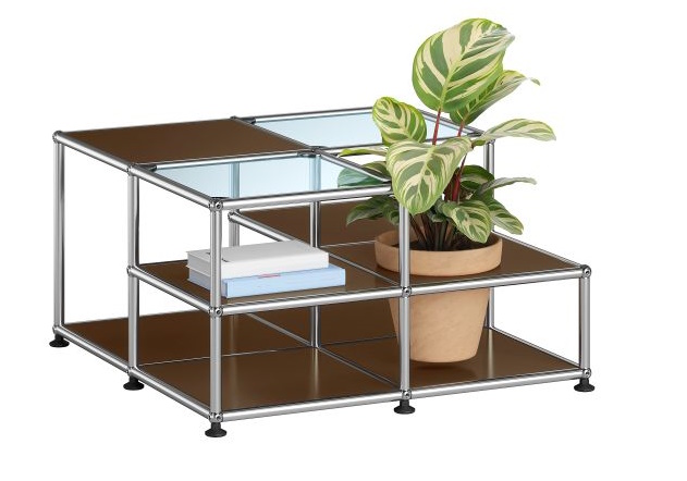 Moderner USM Haller Beistelltisch mit Pflanze, Bücher und braunen Paneelen. Designmöbel für Wohnzimmer und Büro.