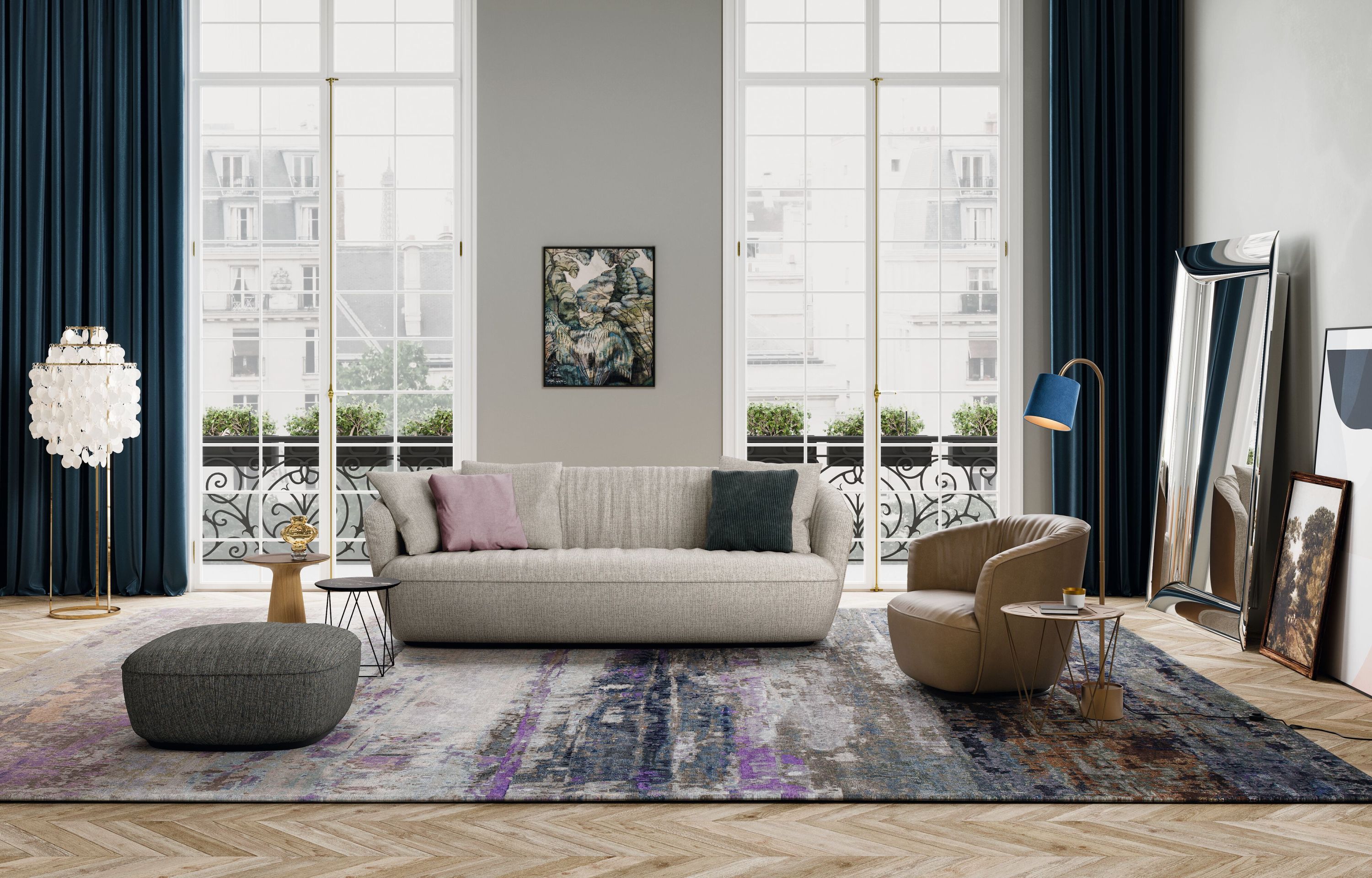 Wohnzimmer mit Ishino Hocker, Sofa, Sessel und Teppich in modernem Design.