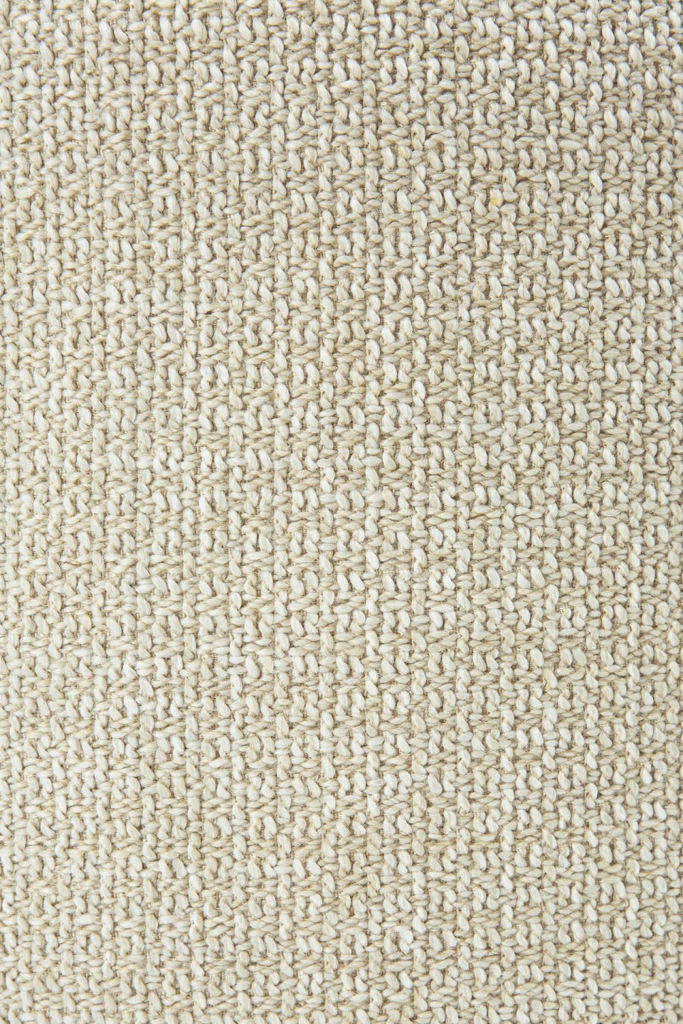 Detailaufnahme des beigen Stoffbezugs vom Ethnicraft Donut Sitzhocker für den Außenbereich.