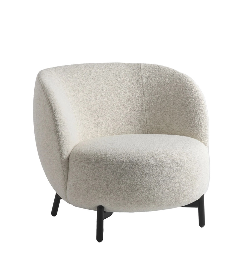 Weißer Lunam Sessel von Kartell mit Bouclé-Bezug und schwarzen Füßen. Moderner Design Sessel für Wohnzimmer.