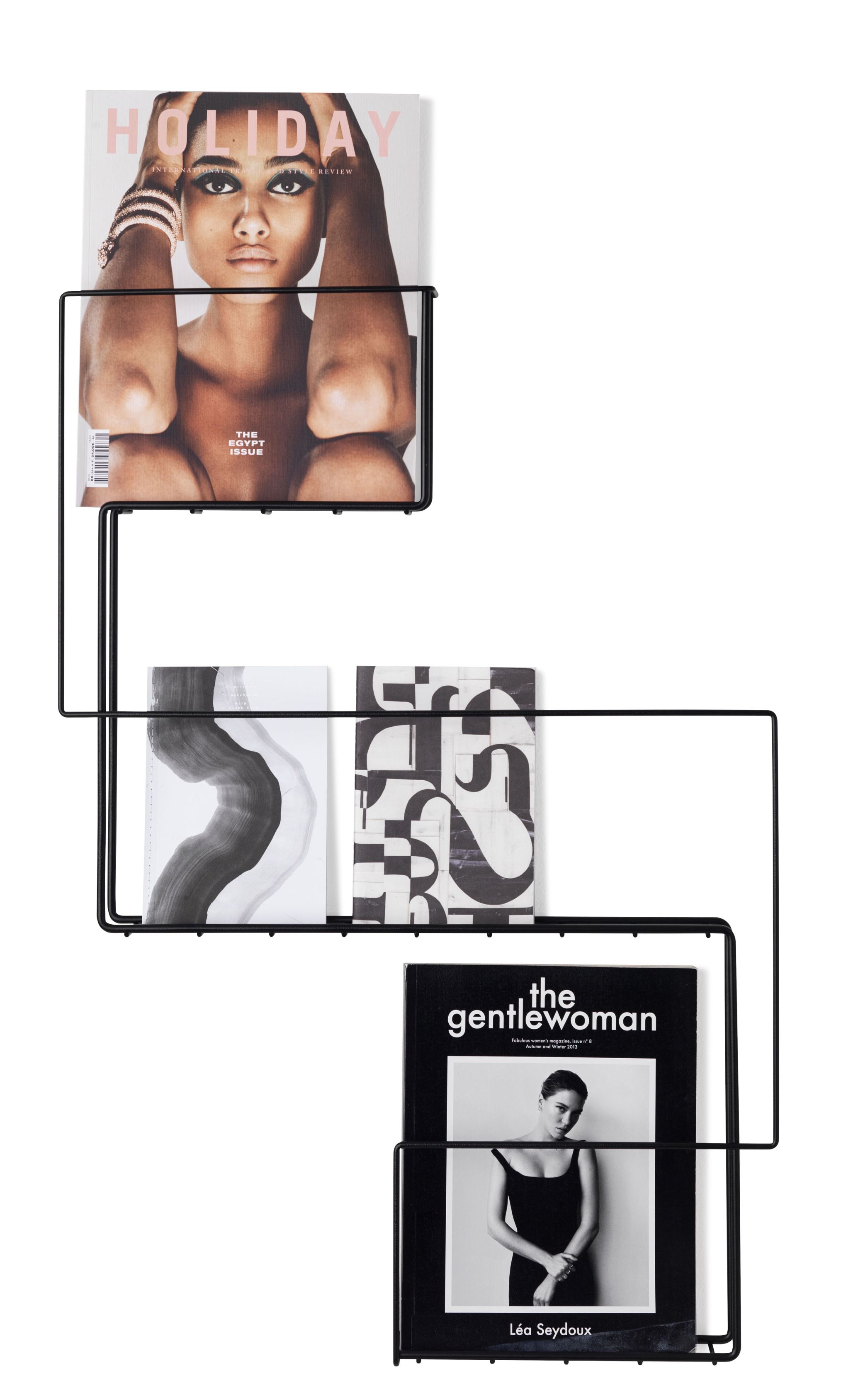 Schönbuch Revue Wand-Zeitungsständer aus schwarzem Metall mit Zeitschriften und Büchern. Moderner Prospekthalter für die Wand.