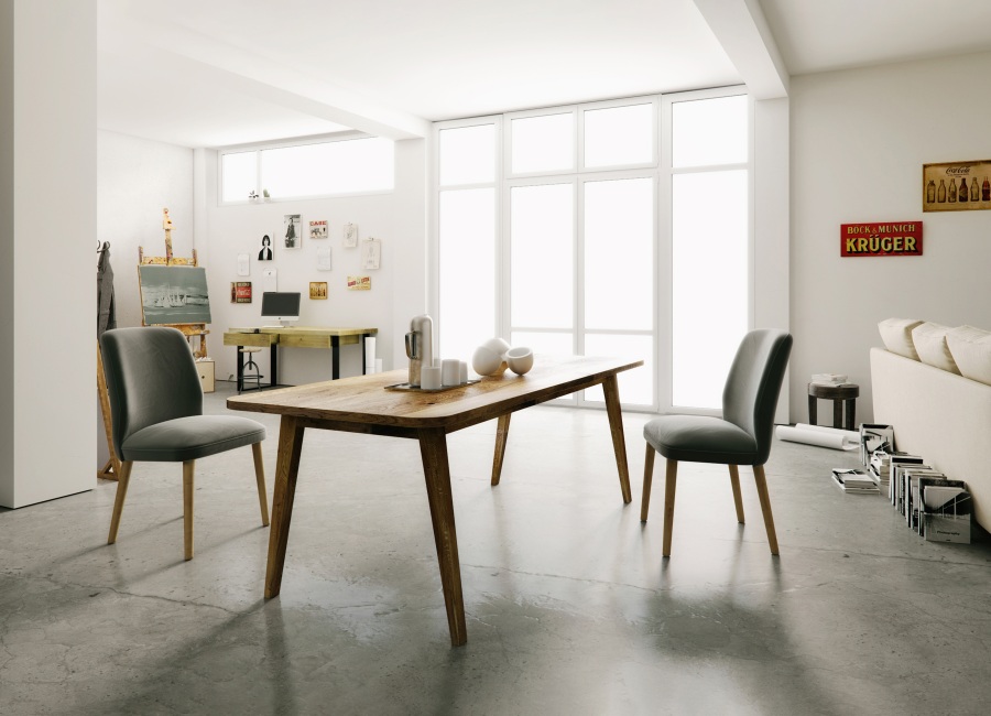 Lav Esstisch Trebord aus Holz mit zwei grauen Stühlen in einem hellen, modernen Wohnraum.