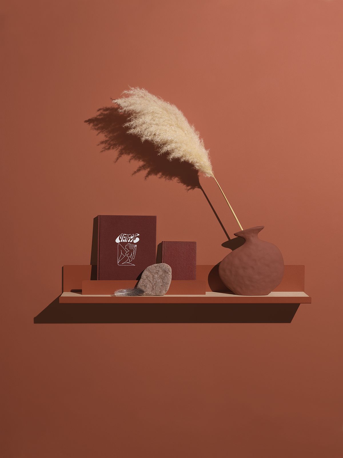 Edit Shelf Regal von Mizetto mit Deko-Objekten in erdigen Tönen. Wandregal für Bücher und Vasen.