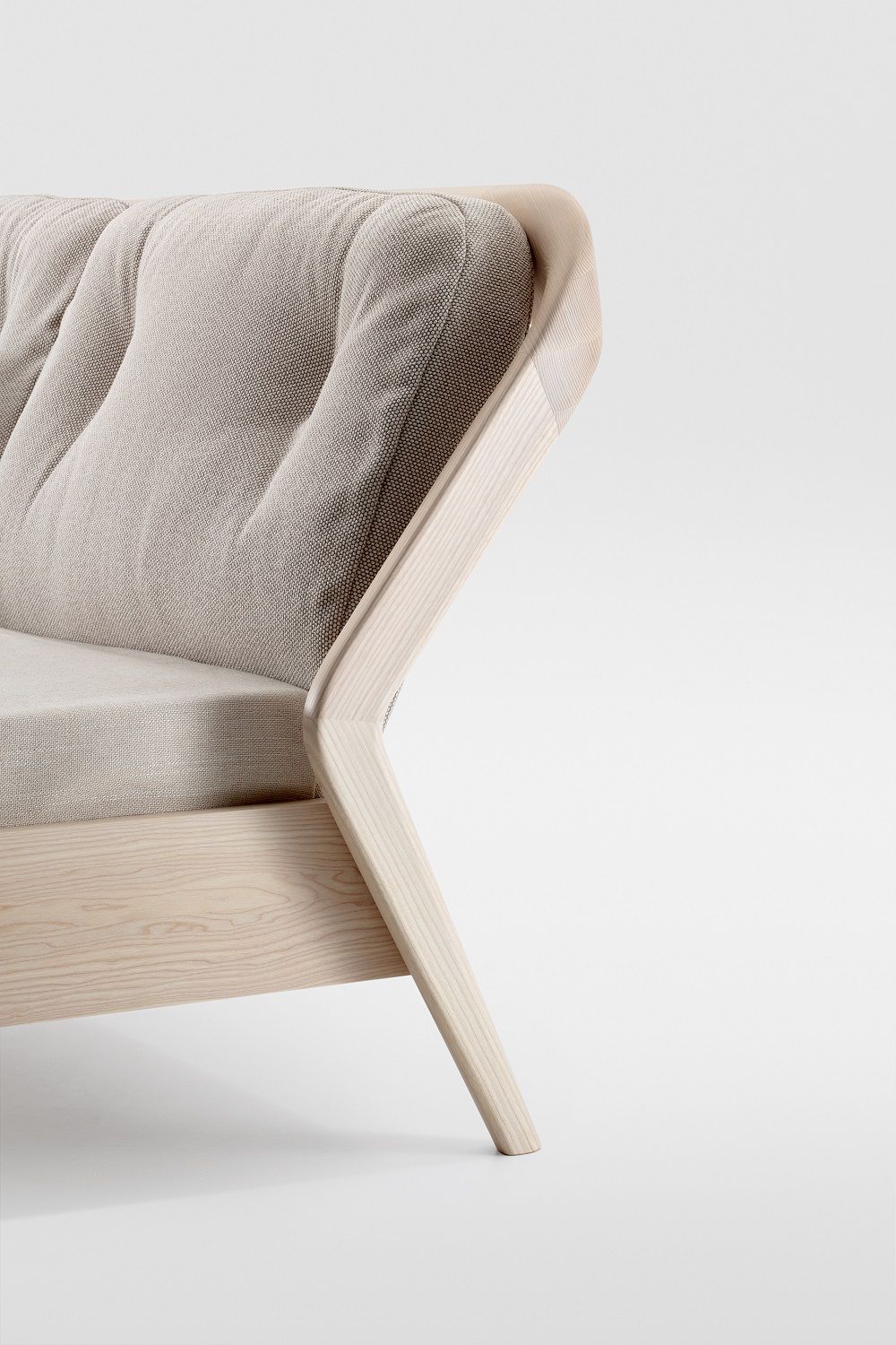 Detailaufnahme vom Friday Night Bett: Massivholzrahmen und gepolstertes Kopfteil in Beige.