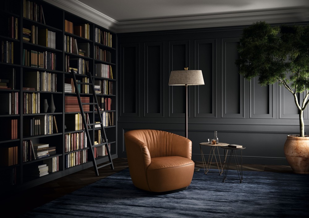 Joco Beistelltisch von Walter Knoll neben Sessel und Lampe in stilvollem Wohnzimmer.