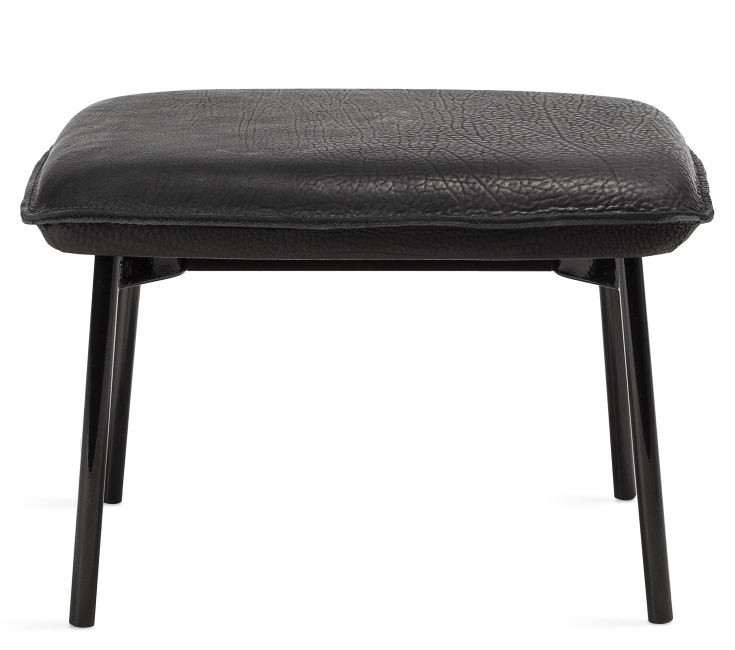 Schwarzer Grace Ottoman von Freifrau Manufaktur mit Lederbezug und filigranem Metallgestell.