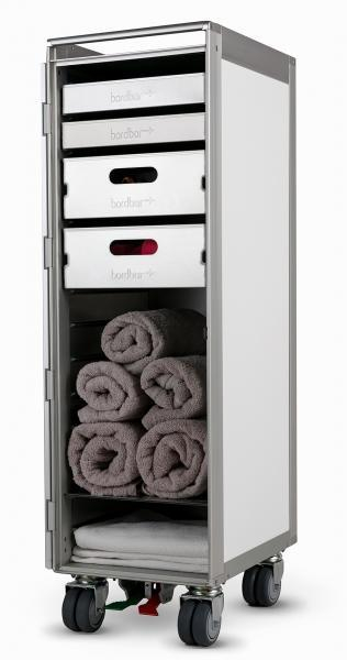Bordbar Wellness Equipment Set: Rollbarer Servierwagen mit Handtüchern und Schubladen für Spa-Zubehör.