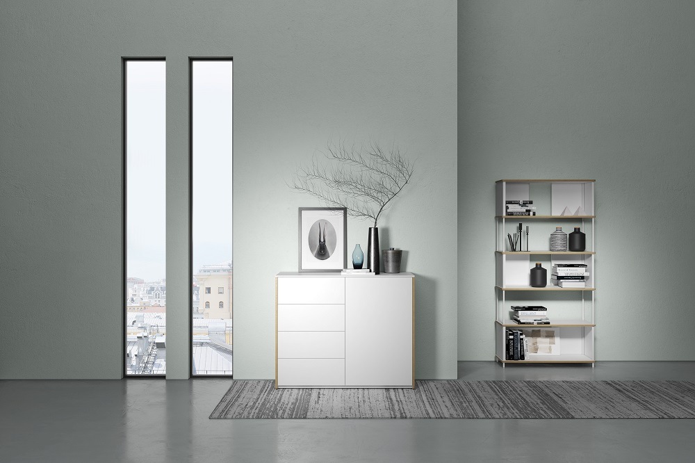 Weiße Modular Plus Kommode von Müller Möbelwerkstätten mit Tür rechts im modernen Wohnraum.