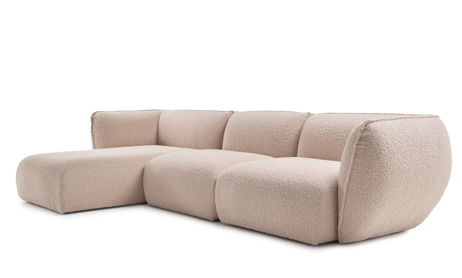 Mia Modular Sofa von Freifrau Manufaktur, beige, mit Ottomane. Moderne Wohnlandschaft für stilvolles Wohnen.