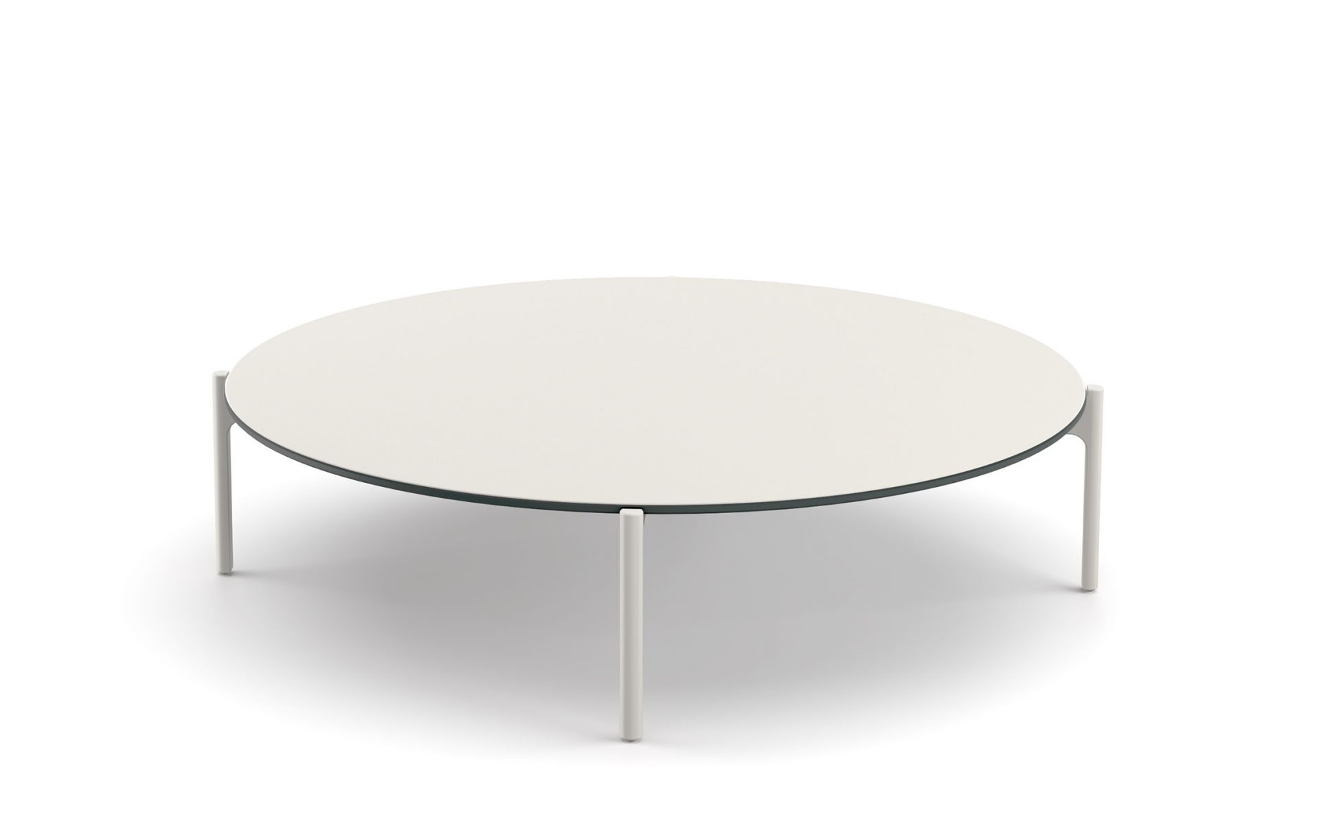 Izon Kaffeetisch von Dedon, runde Tischplatte in Weiß mit filigranem, weißem Untergestell.