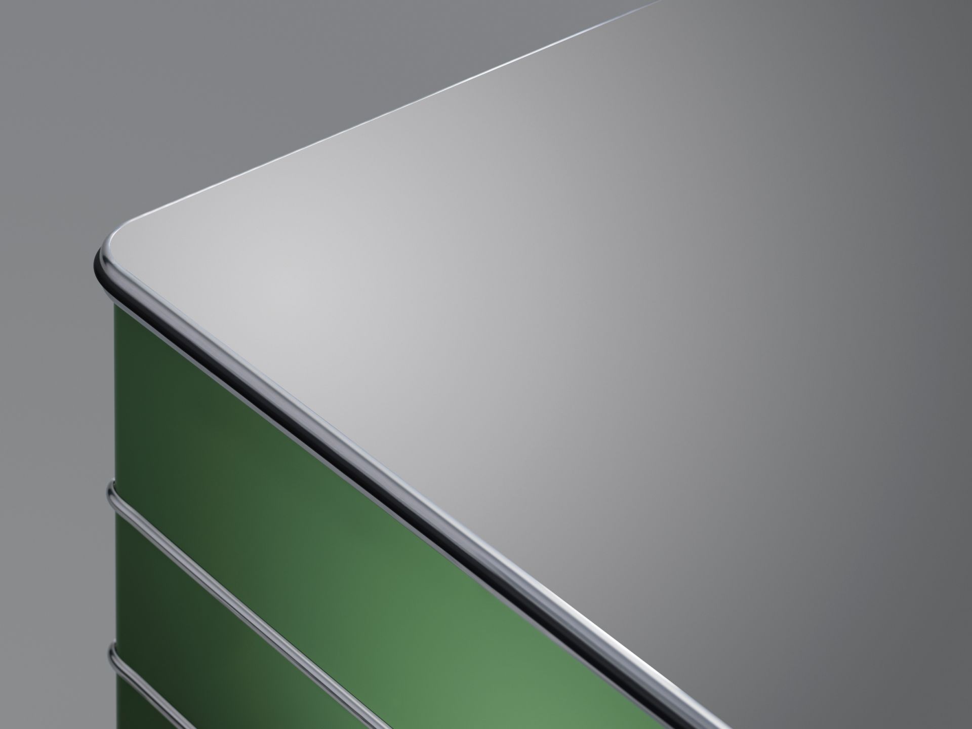 Detailaufnahme vom TB 225 Classic Line Schreibtisch von Müller Möbelfabrikation, Tischplatte in Weiß, Gestell in Grün.