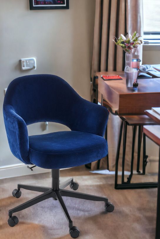 Blauer Saarinen Relax Konferenzstuhl mit Armlehne und 5-Stern Drehfuß von Knoll International.