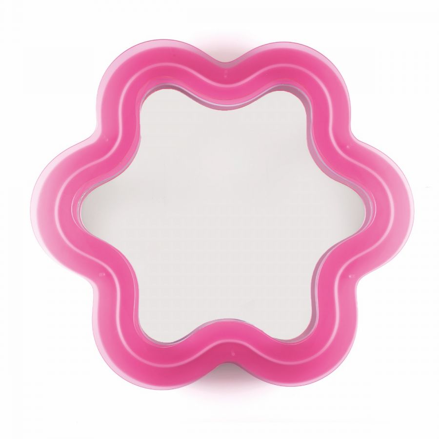 Supercurve Flower Spiegel von Seletti, pinkfarbener Design Spiegel in Blumenform für Wand oder Tisch.