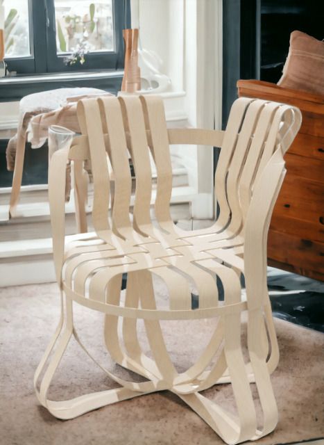 Cross Check Stuhl von Knoll International mit Armlehnen, gefertigt aus hellem Holz, modernes Design.