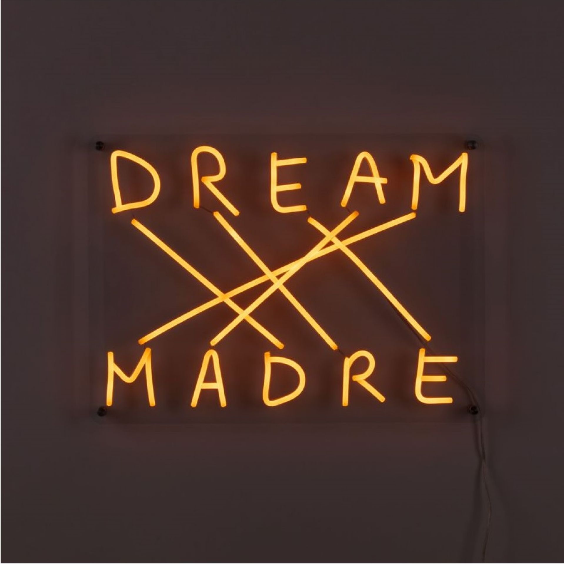 Dream Madre LED Wandleuchte von Seletti: Dimmbare Designerlampe mit Neon-Schriftzug für stimmungsvolle Beleuchtung.