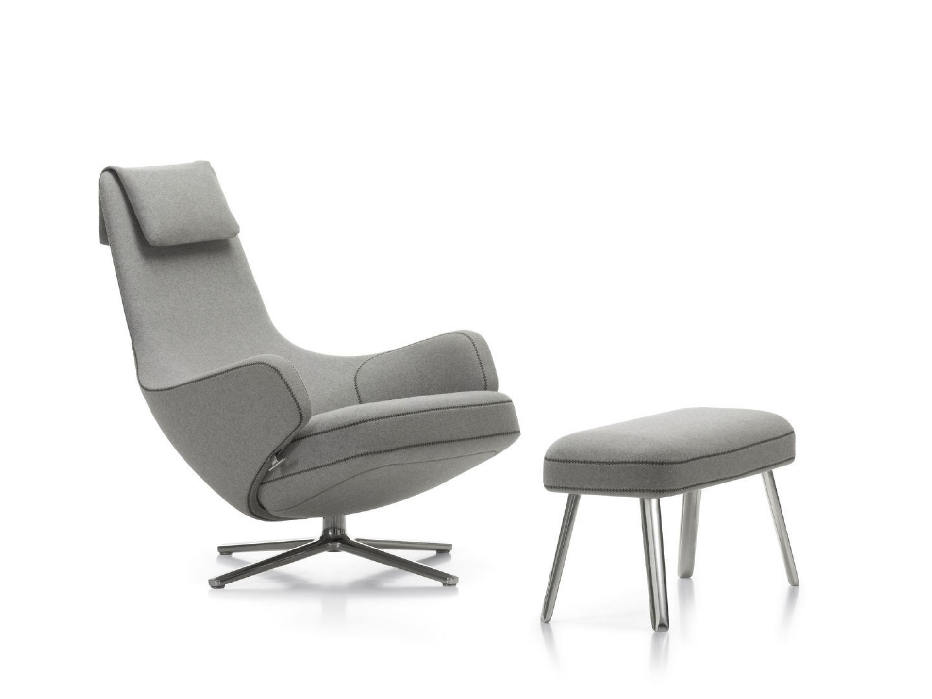 Grauer Repos Sessel von Vitra mit passendem Panchina Hocker auf weißem Hintergrund.