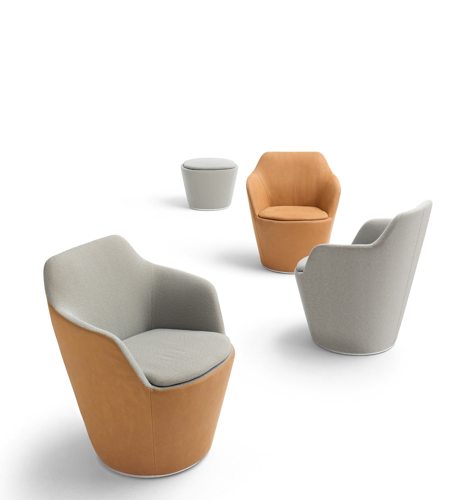 Flint Hocker und Sessel von Cor mit Tellerfuß, drehbar, in verschiedenen Farben.