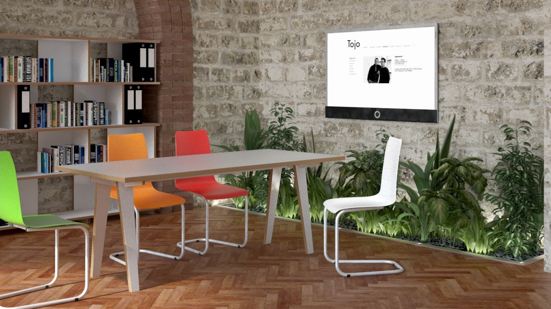 Heller Tojo Tisch mit farbigen Stühlen in modernem Büroambiente, geeignet für Konferenz oder Homeoffice.