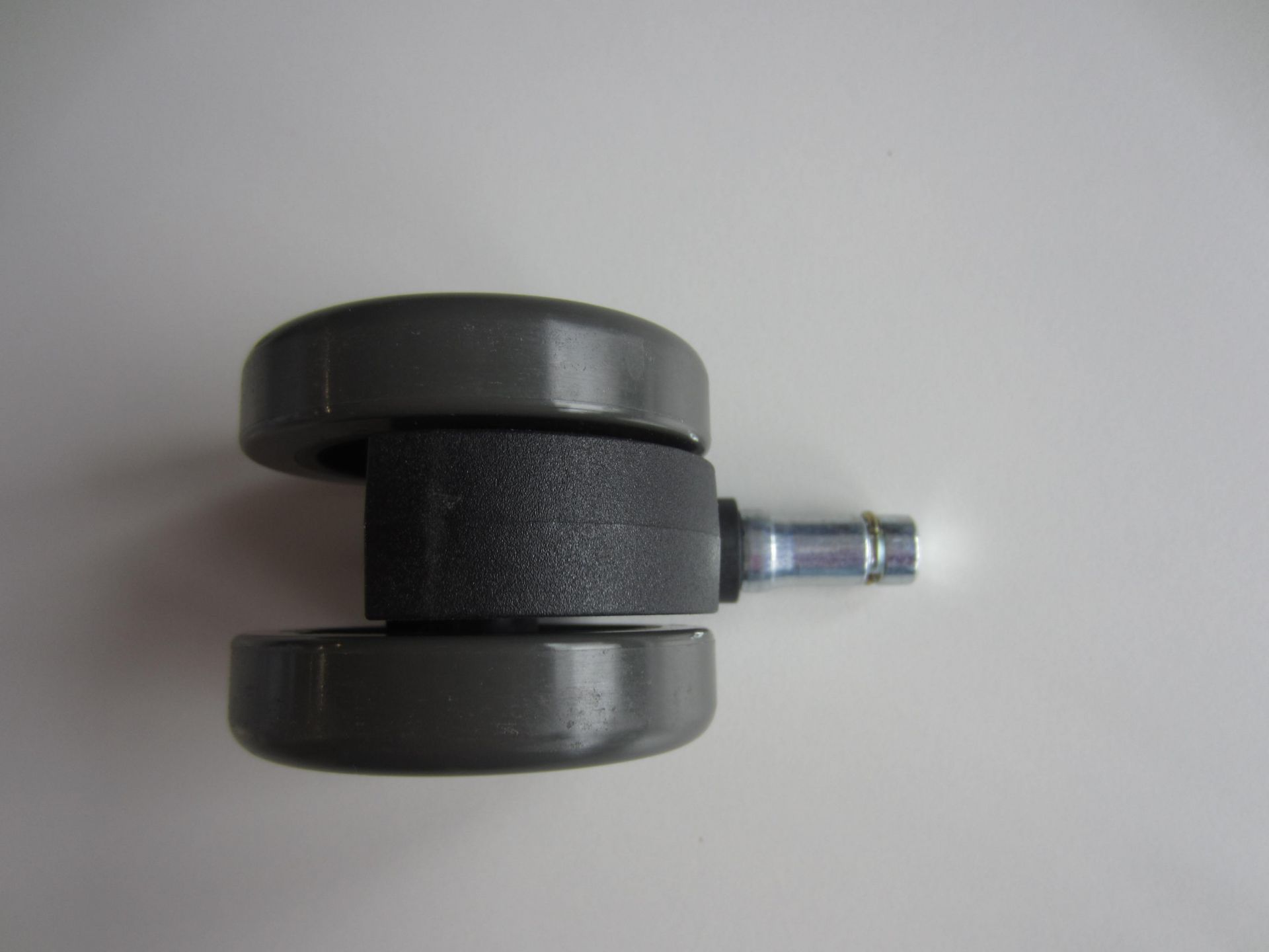 Vitra MedaPal Drehstuhlrolle, ø 60mm, graue Doppelrolle mit Stift für Bürostuhl, Ersatzteil.