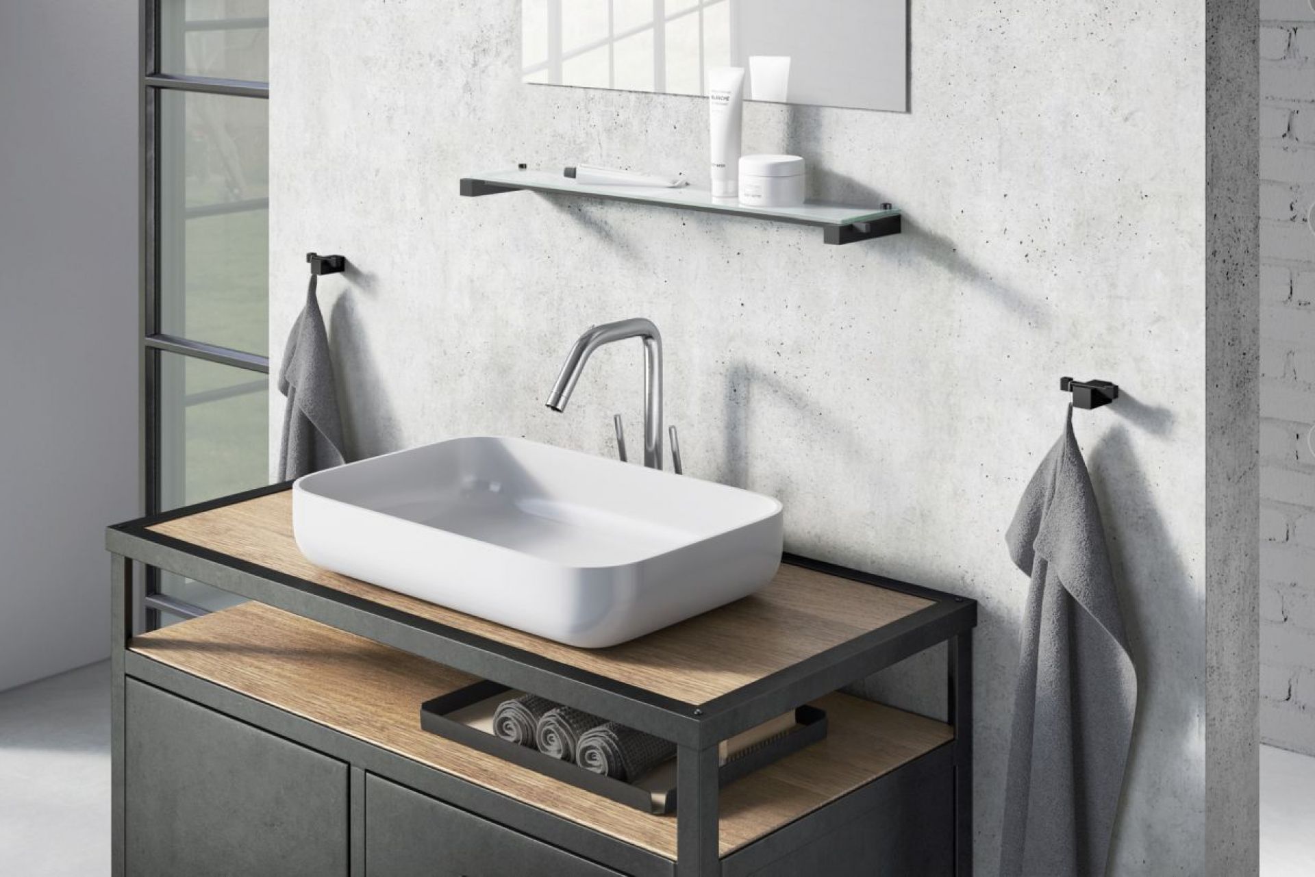 Badezimmer-Szene mit zwei schwarzen Carvo Handtuchhaken von ZACK, jeweils mit einem grauen Handtuch.