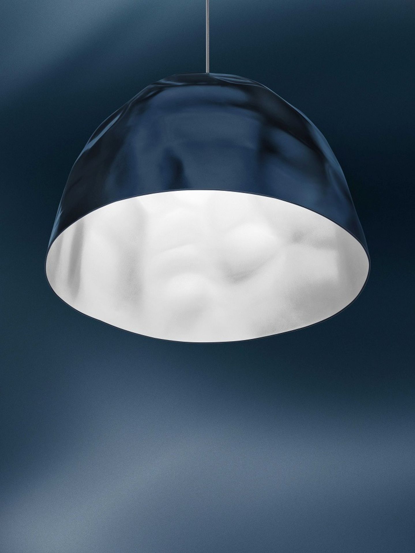 Nahaufnahme der Foscarini Bump Pendelleuchte in Petrol, modernes Design für Wohnzimmer und Esszimmer.