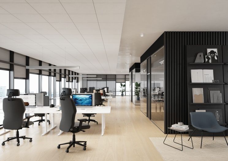 Büro mit mehreren Interstuhl XXL Schwerlaststühlen XL113 mit Kopfstütze an höhenverstellbaren Schreibtischen.