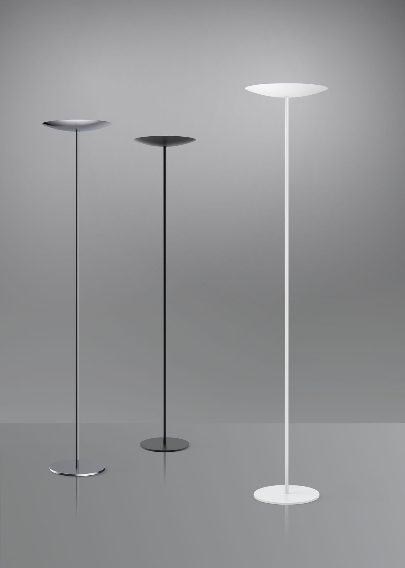 Drei Belux Stehleuchten in Silber, Schwarz und Weiß. Moderne LED Bodenleuchten.