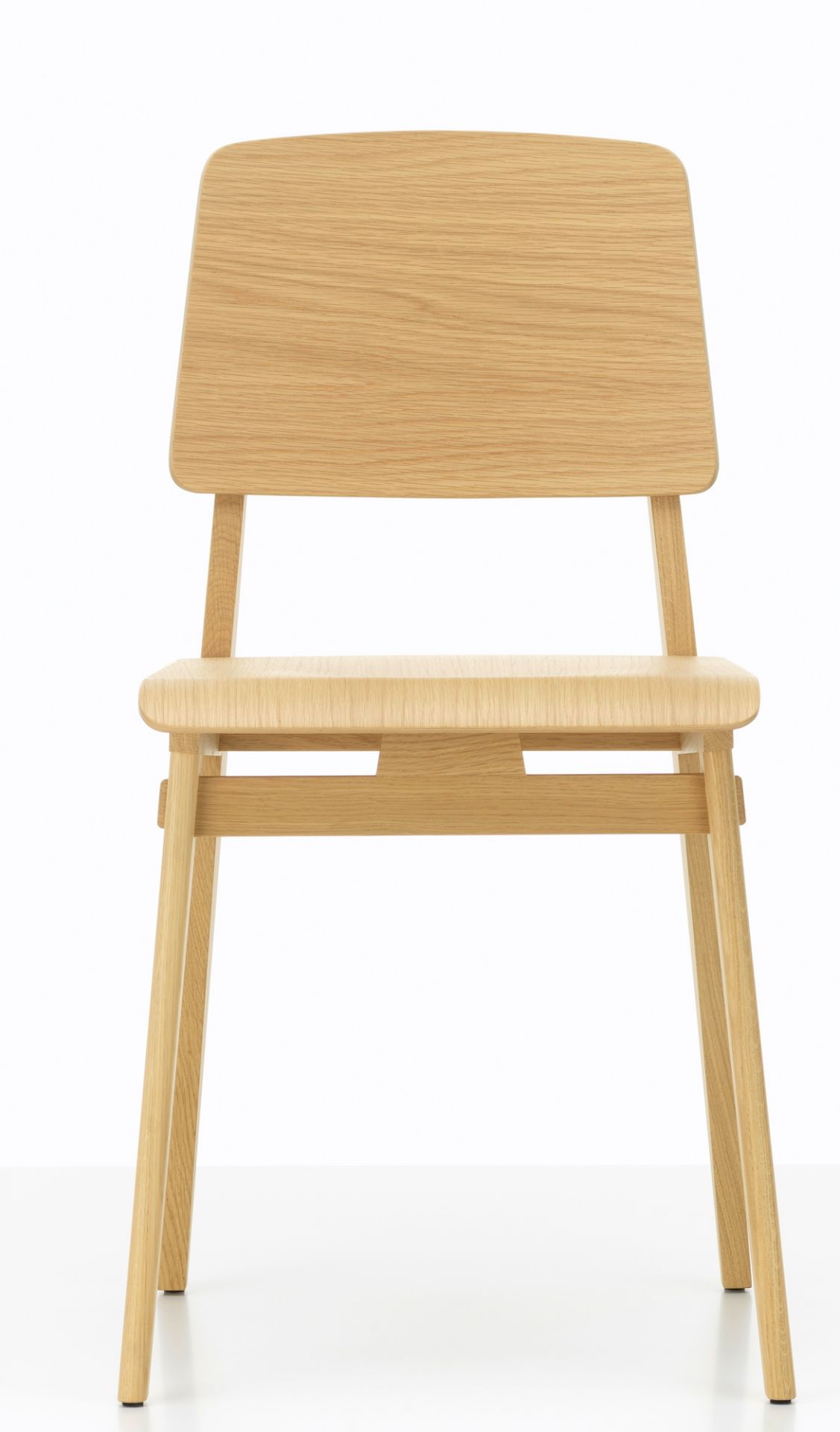 Vorderansicht des Vitra Chaise Tout Bois Stuhls aus hellem Holz, minimalistisches Design.