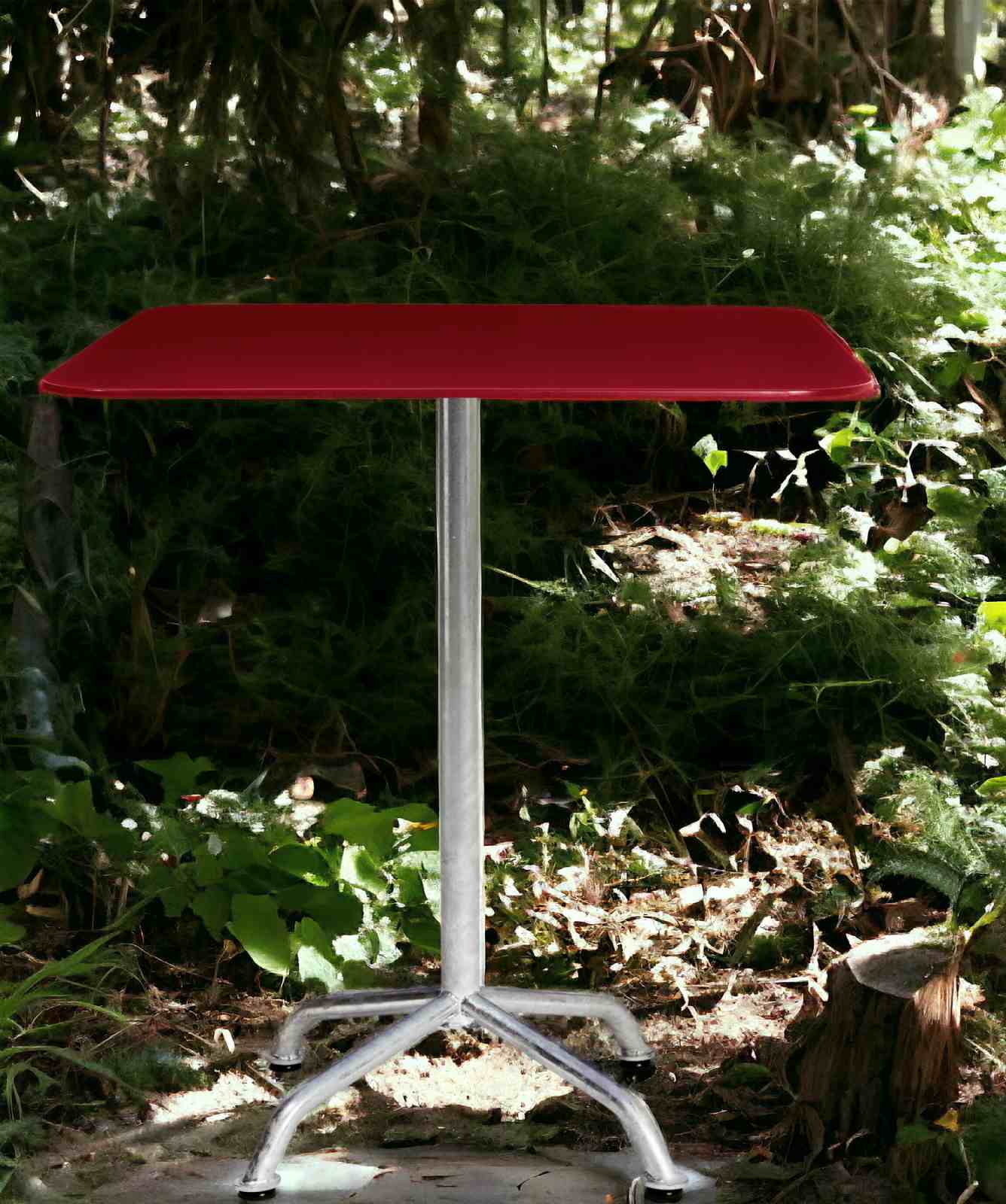 Roter Haefeli Gartentisch mit Stahlgestell im Freien, ideal für Garten, Terrasse und Balkon.