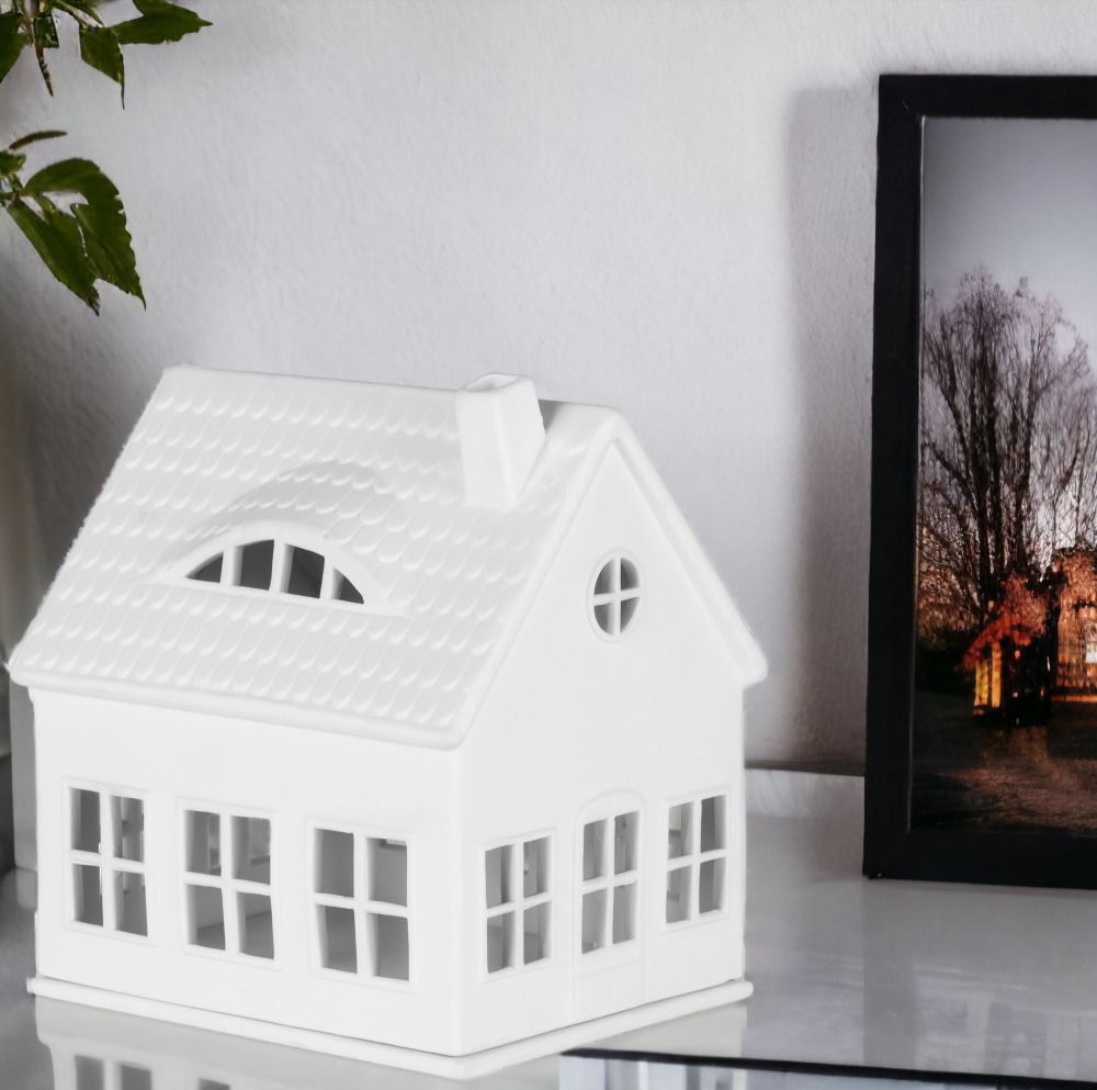 Weißes Lichthaus Gaubenhaus von Räder, dekorative Keramikhaus-Laterne für stimmungsvolle Beleuchtung im Wohnbereich.