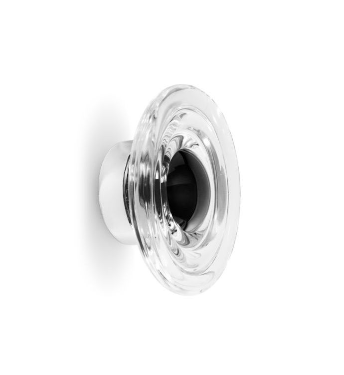 Nahaufnahme der Tom Dixon Press Surface Mini LED Wandleuchte aus transparentem Glas.