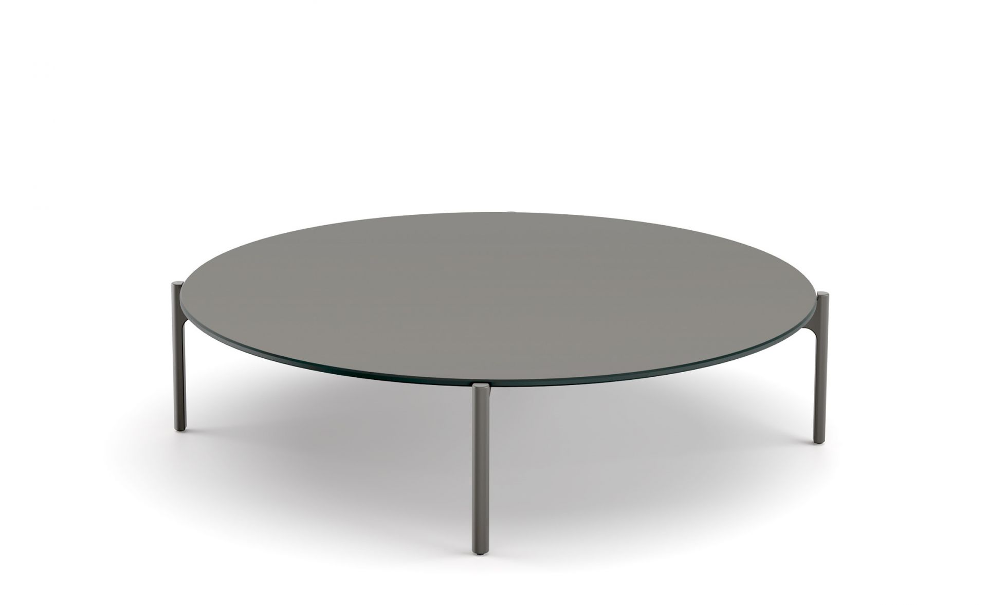 Izon Kaffeetisch von Dedon, runder Wohnzimmertisch mit grauer Tischplatte und filigranem Metallgestell.