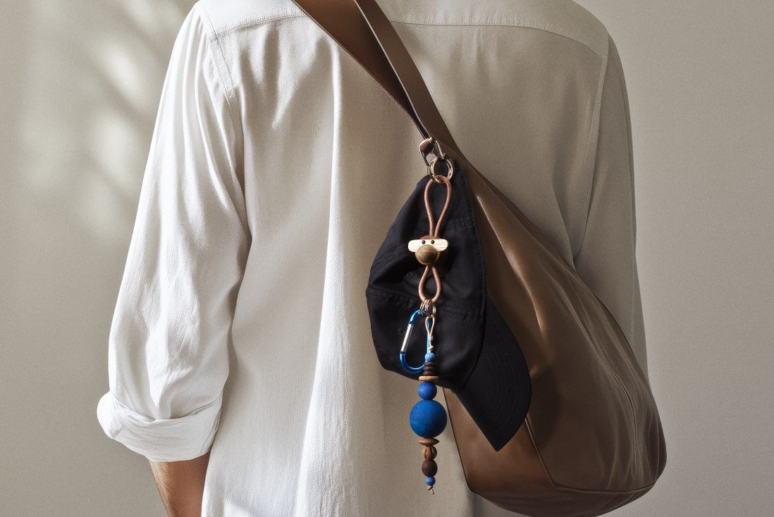 Affe Schlüsselanhänger goldfarbenes Metall mit Naturleder Kay Bojesen