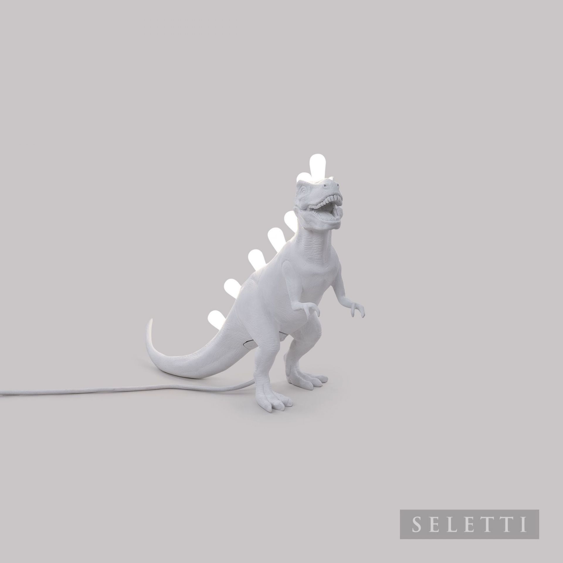 Weiße Jurassic Lamp Rex Leuchte von Seletti: T-Rex Lampe mit Glühbirnen auf dem Rücken.
