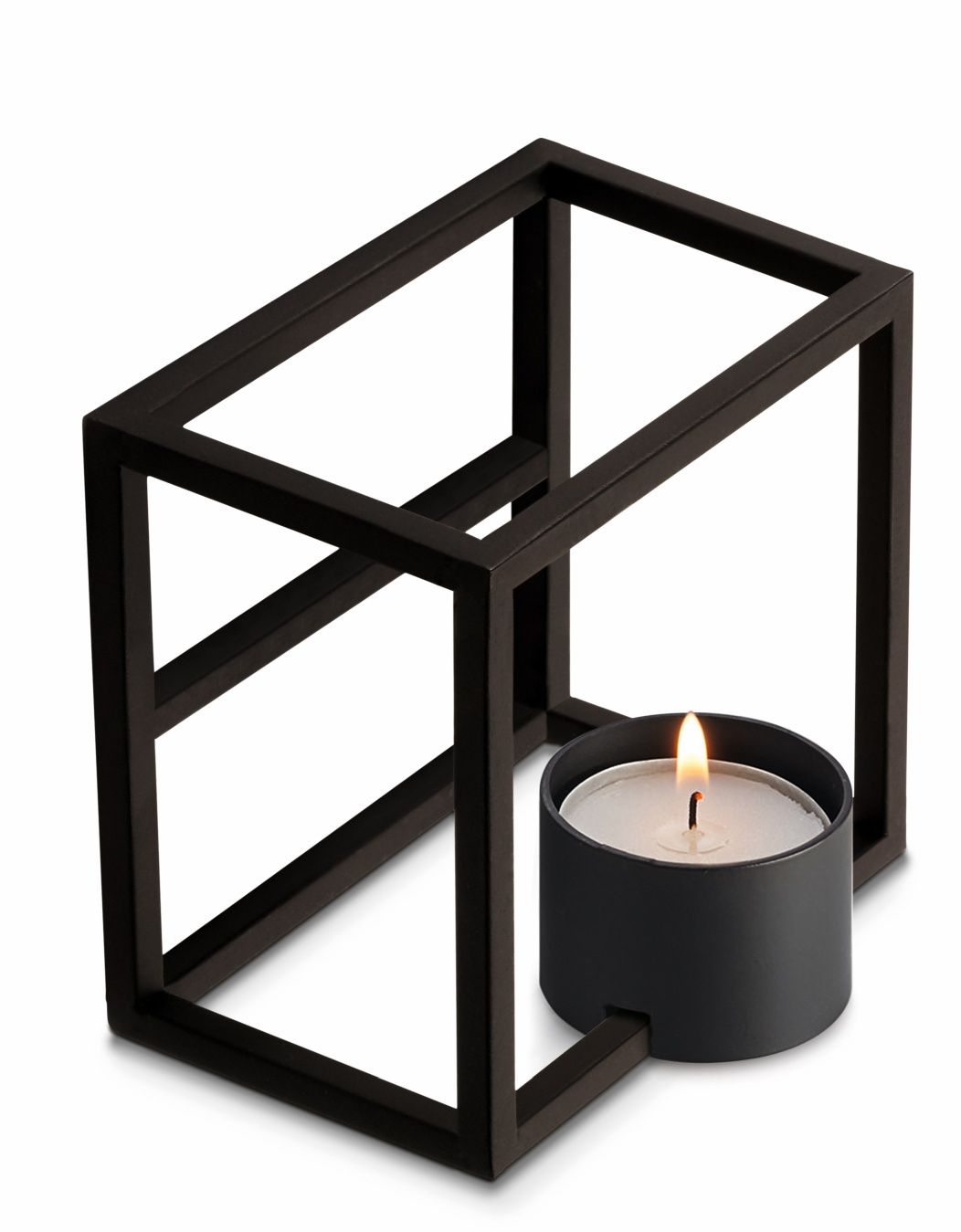 Schwarzes Cubo Stövchen von Philippi mit Teelicht, modernes Design für gemütliche Atmosphäre.