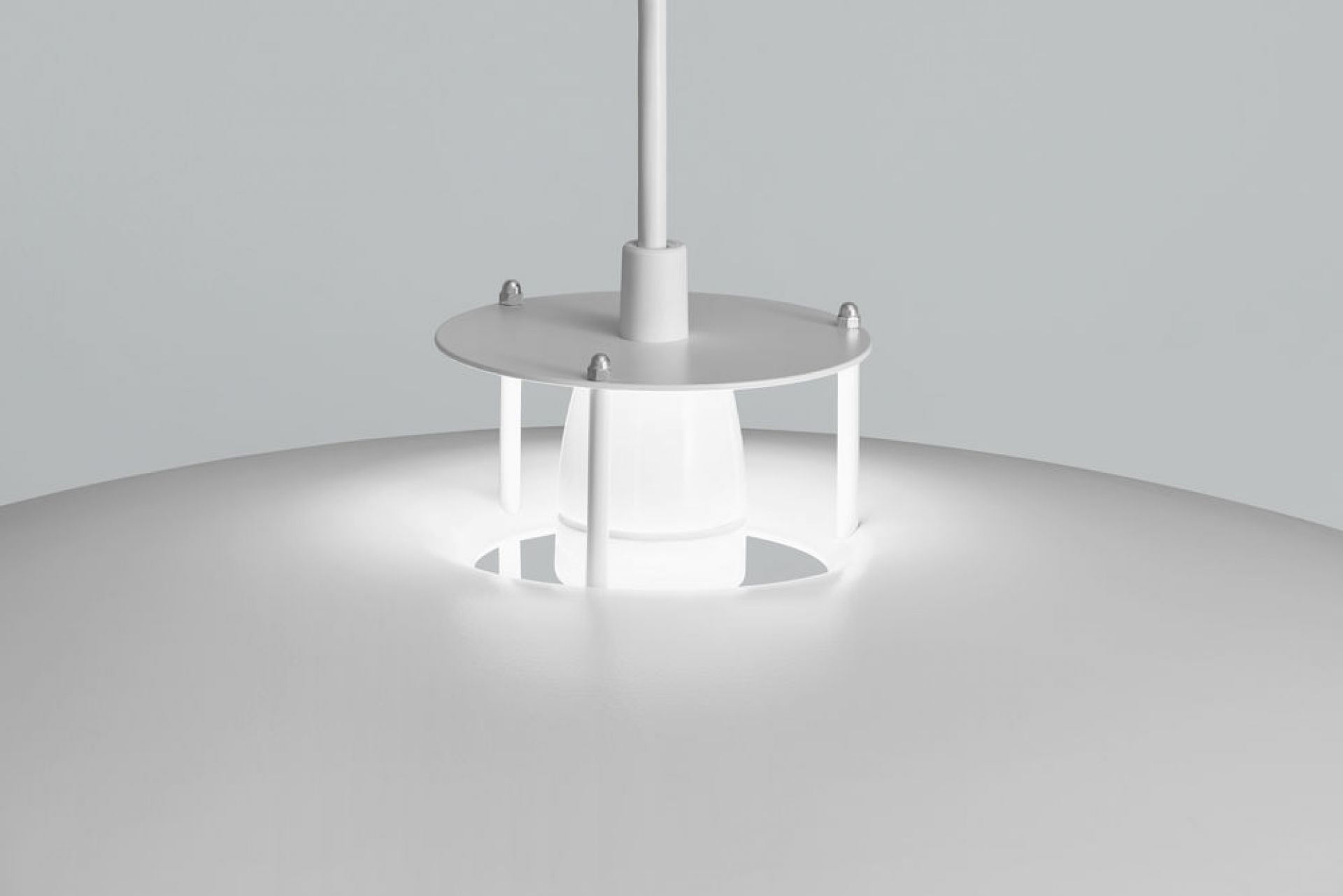 Detailaufnahme der weißen JL341 Pendelleuchte von Artek, modernes Design mit sanftem Lichtschein.