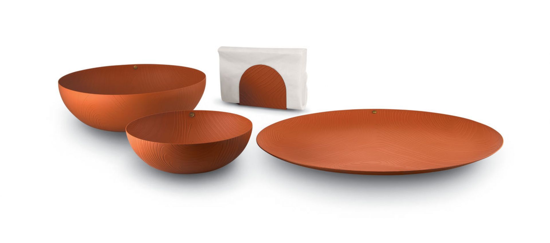 Alessi PU08 Serviettenhalter und passende Schalen aus Edelstahl mit Holzfurnier-Optik. Tischdeko für stilvolle Dinner.