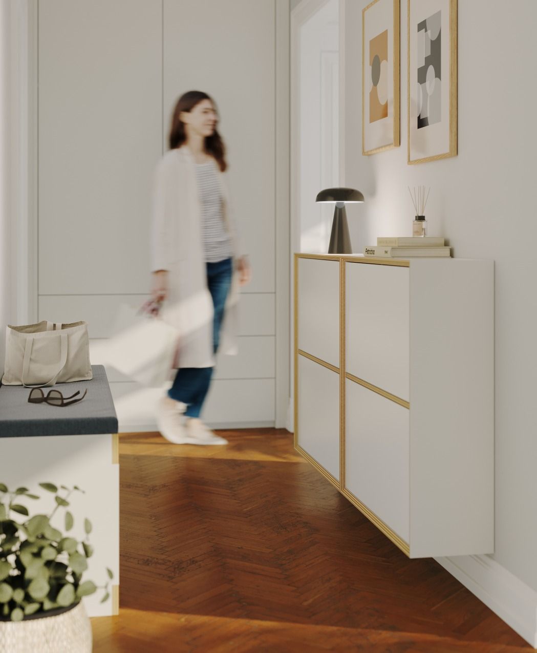 Moderner Vertiko Schuhrank von Müller Möbelwerkstätten in Weiß mit goldenen Akzenten im Flur.