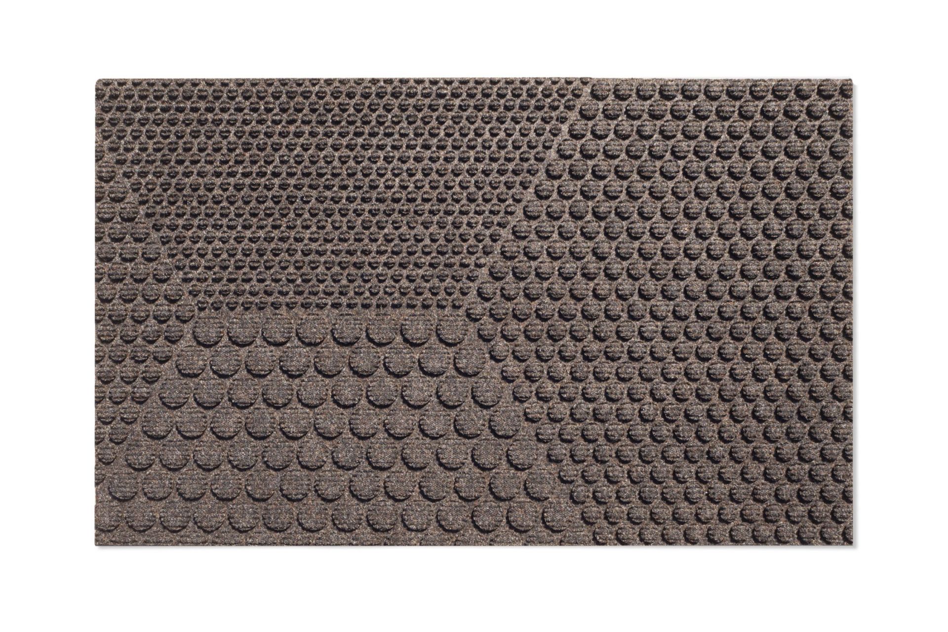 Braune Hex Fußmatte Soil von Heymat (55x90 cm) mit erhabenem, kreisförmigem Muster für den Innenbereich.
