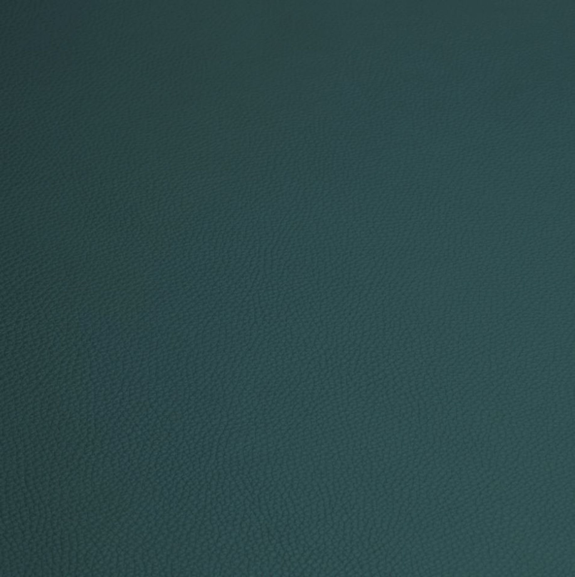 Detailaufnahme der grünen Lederauflage für USM Beistelltisch, 50x50 cm, Leather on Top.