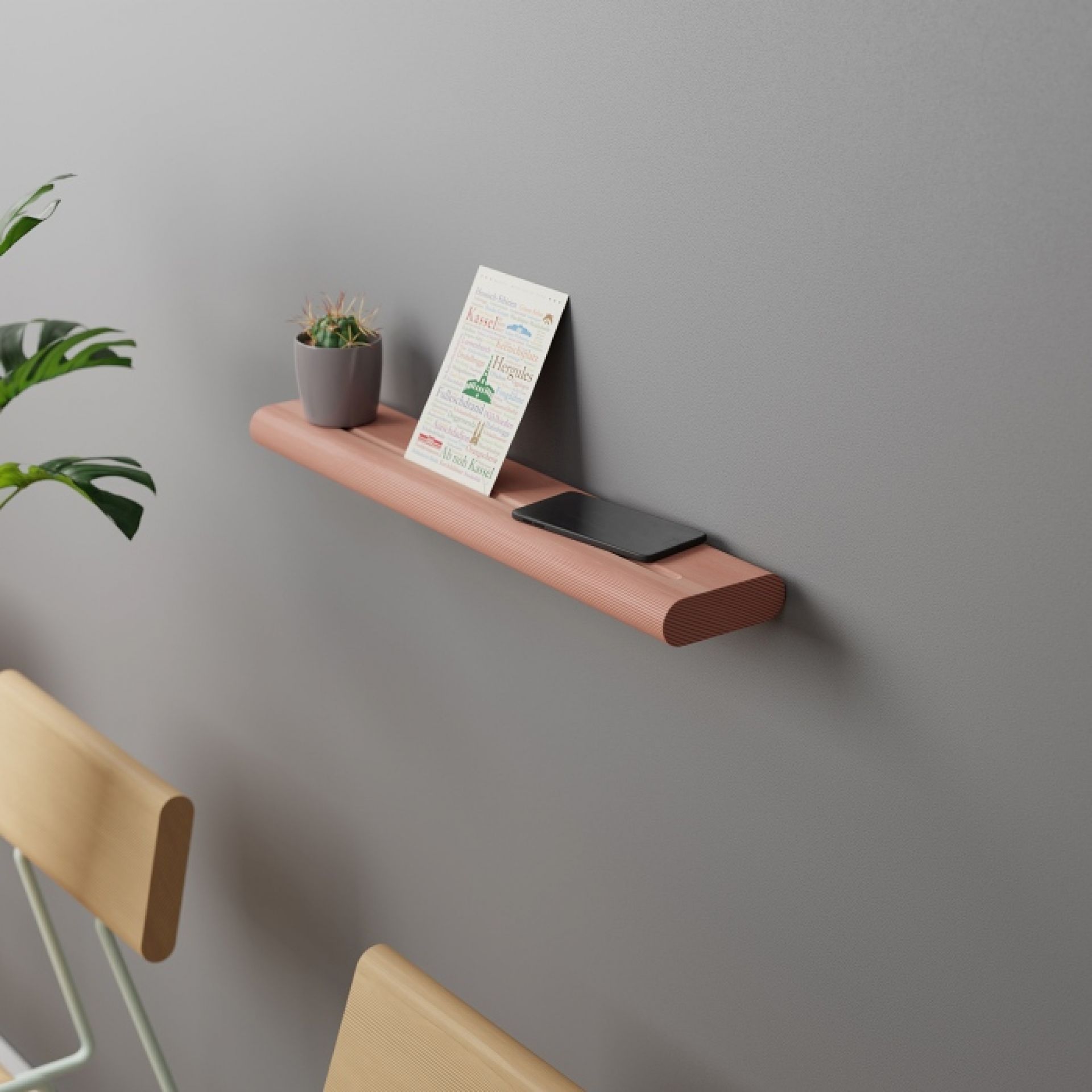 Waldgrünes Wandregal von Fuchs & Habicht: Dekorative Ablage für Bücher, Pflanzen und Smartphone.