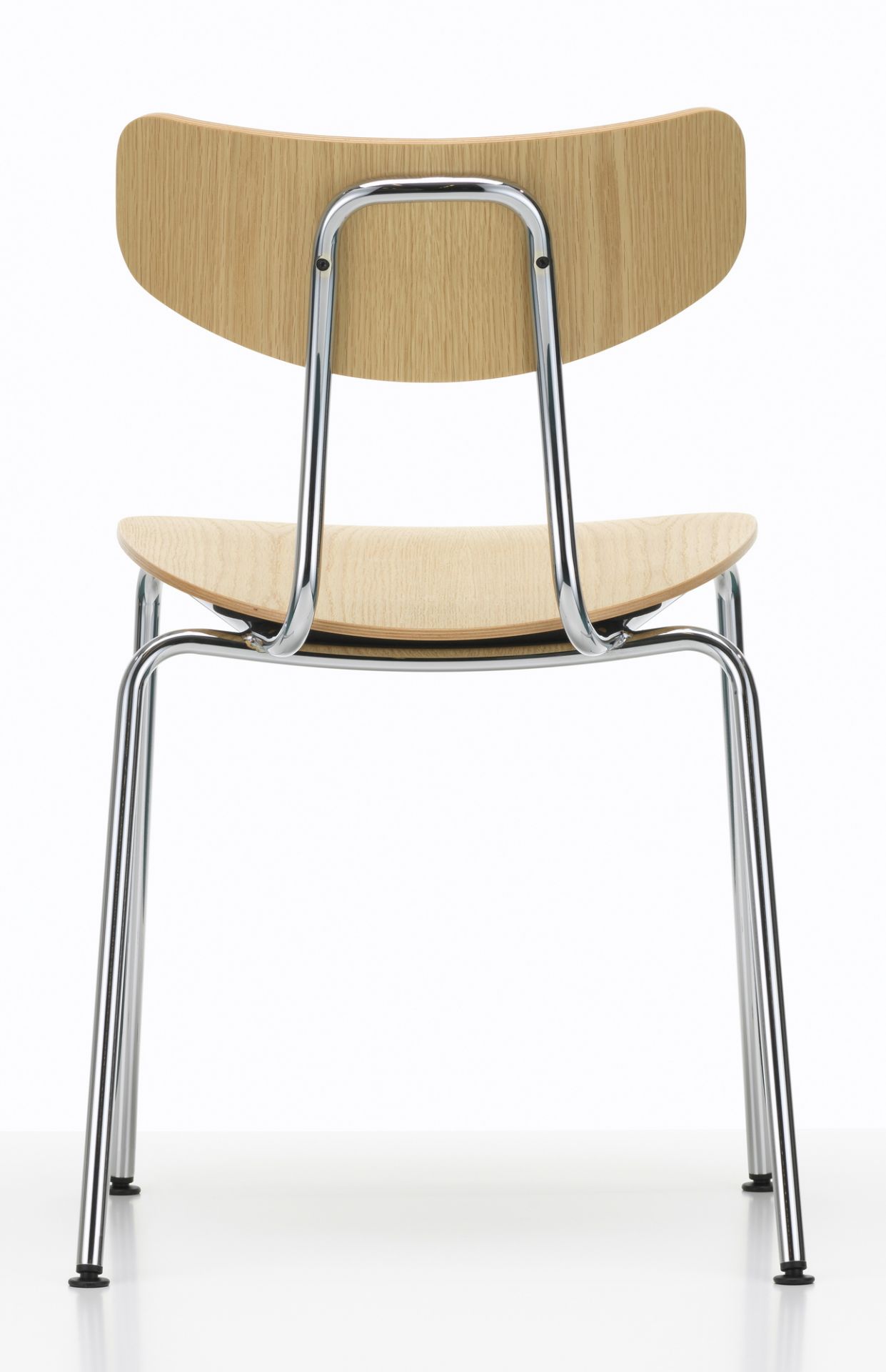 Rückansicht des Moca Stuhls von Vitra mit Holzschale und verchromtem Stahlrohrgestell.