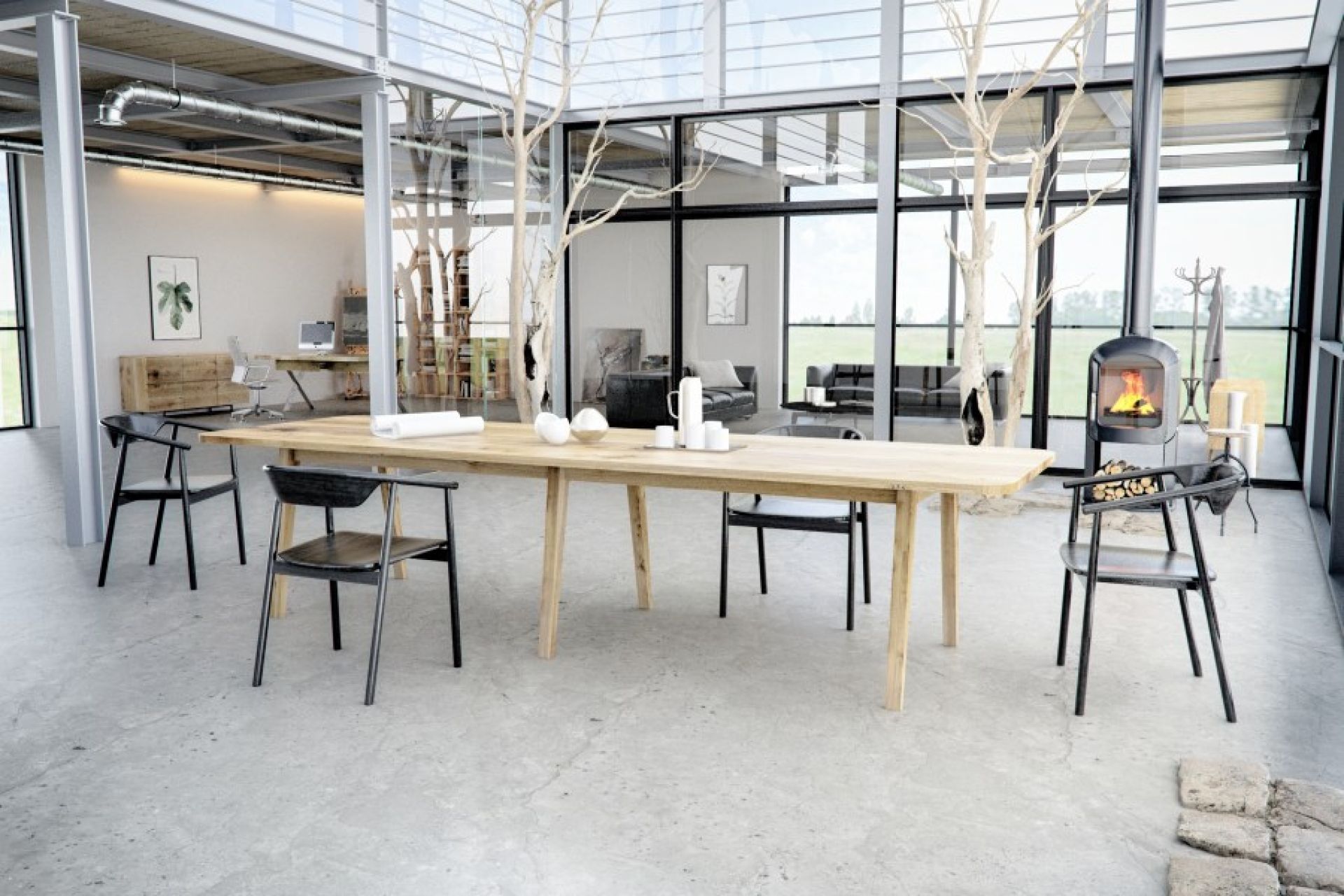 Heller Lav Esstisch Trebord aus Holz mit Stühlen in modernem, lichtdurchflutetem Wohnraum.