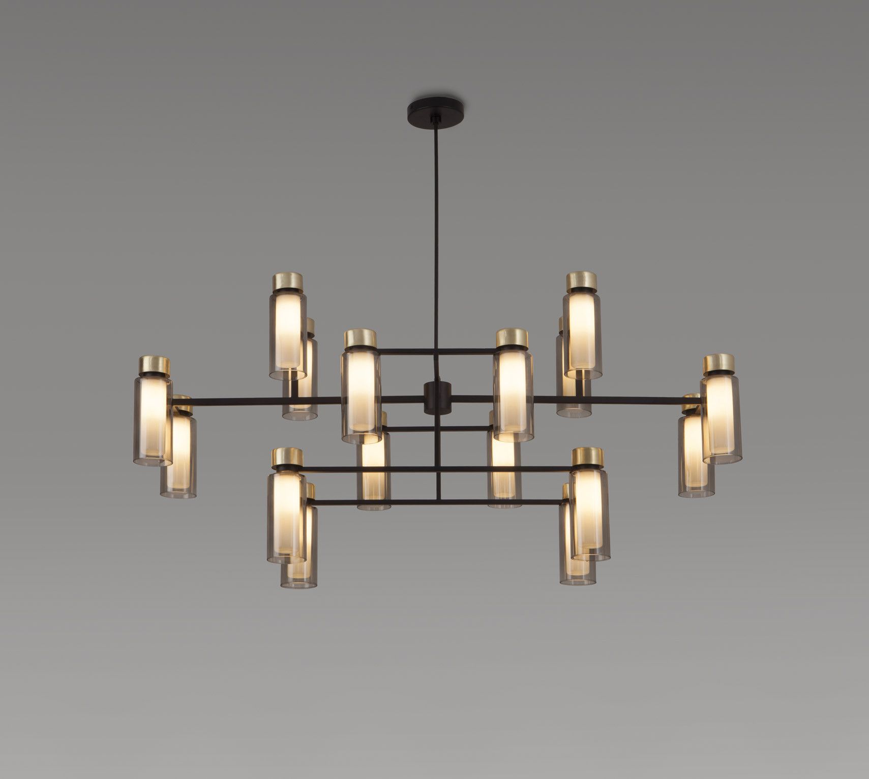 Osman Kronleuchter von Tooy: Moderne Hängelampe mit zylindrischen Glaselementen und schwarzem Metallrahmen.