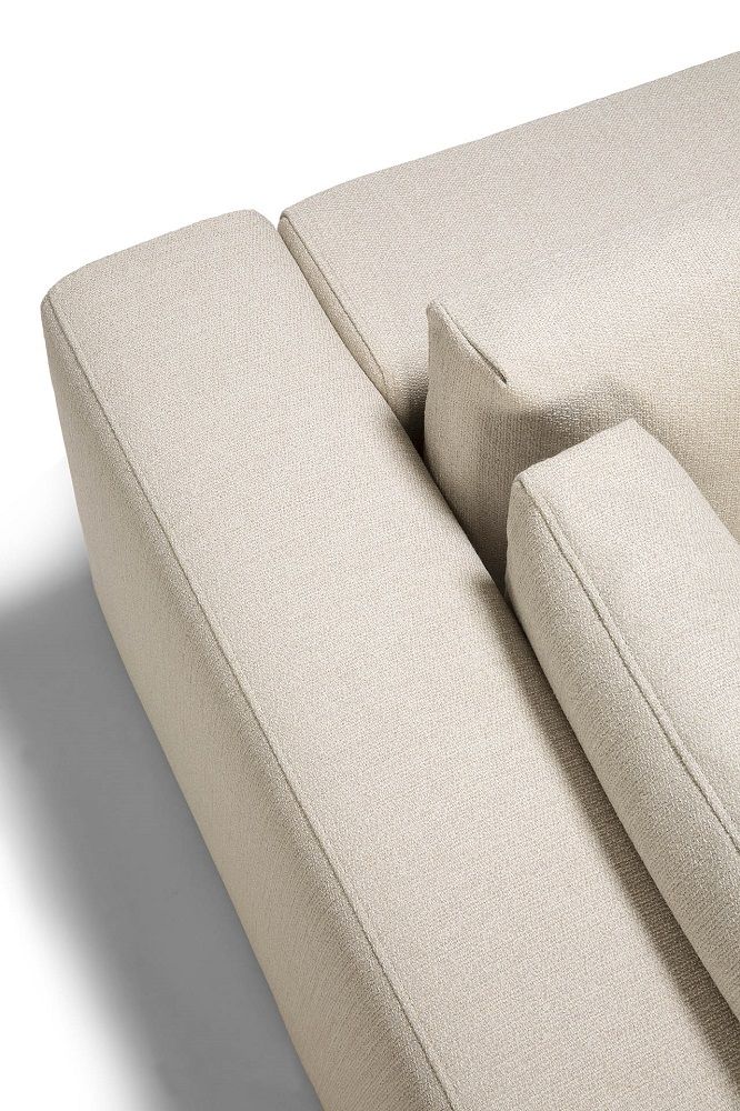 Detailaufnahme Mellow Sofa in Off White mit Eco Stoff, modernes Ecksofa Design.