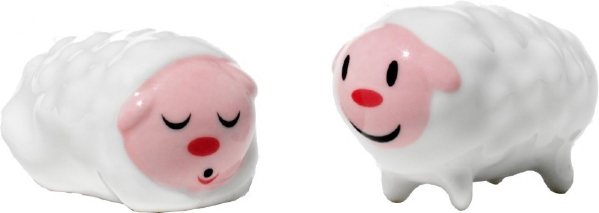 Alessi Tiny Little Sheeps Porzellanfiguren Set: Zwei niedliche, weiße Deko-Schafe mit rosa Gesichtern.