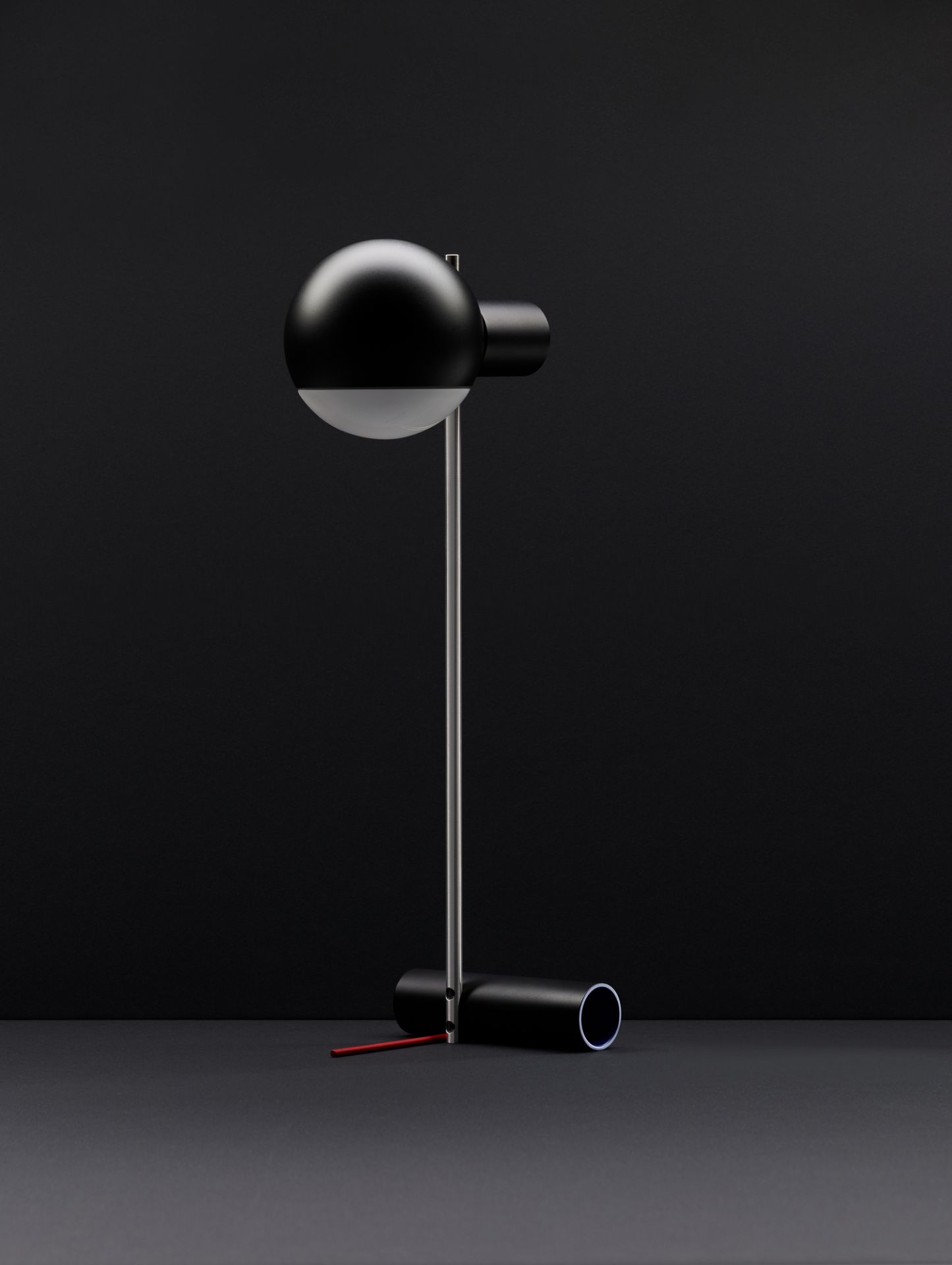 Schwarze L25 Tischleuchte von Tecta: LED Lampe mit glänzendem Finish für Nachttisch oder Schreibtisch.