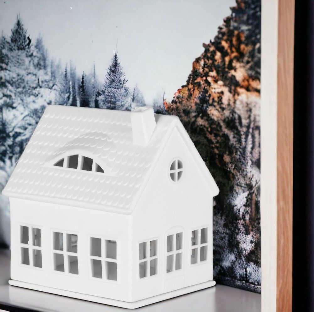 Weißes Lichthaus Gaubenhaus von Räder, dekorative Keramik für stimmungsvolle Beleuchtung im Wohnraum.