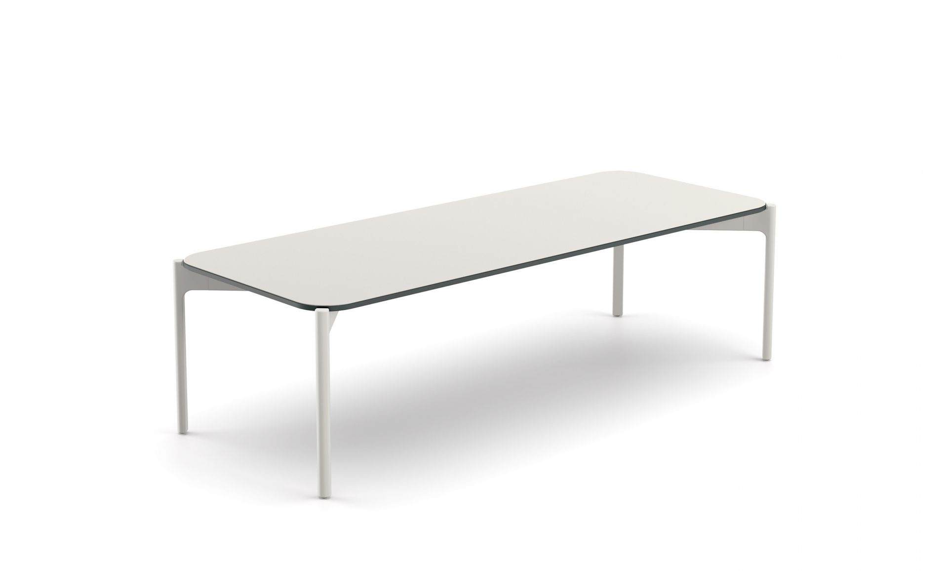 Izon Kaffeetisch von Dedon, 130x50cm, mit weißer Tischplatte und filigranem, hellem Untergestell.
